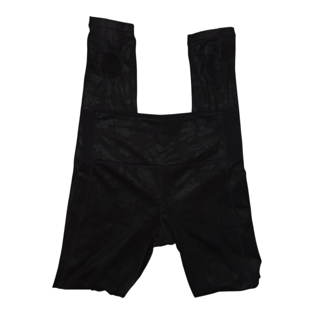 Athleta black floral print leggings with ankle keyhole small